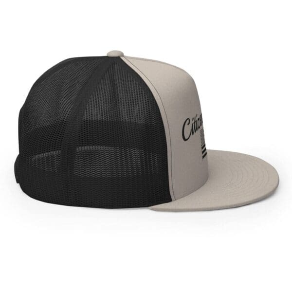 A beige and Black Font trucker hat.