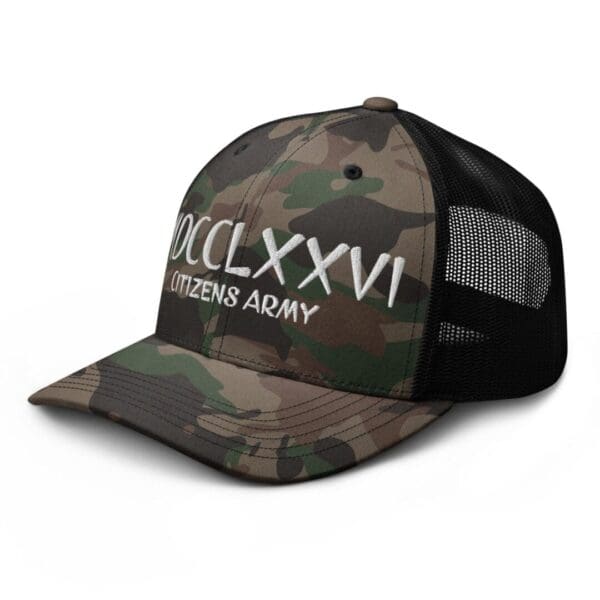 A Camouflage 1247 Snap Back Trucker Hat w/MDCCLXXVI (White Font) with the word dclxviii on it.