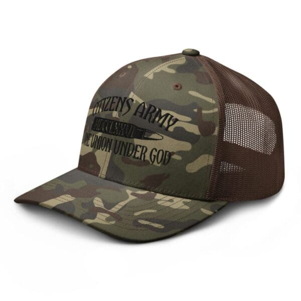 A Camouflage 1247 Snap Back Trucker Hat with a black logo on it.