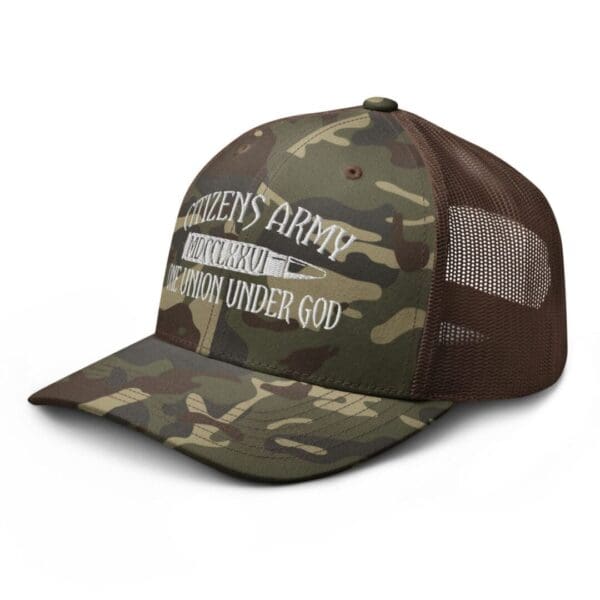 A Camouflage 1247 Snap Back Trucker Hat (White Logo) with the words under god.