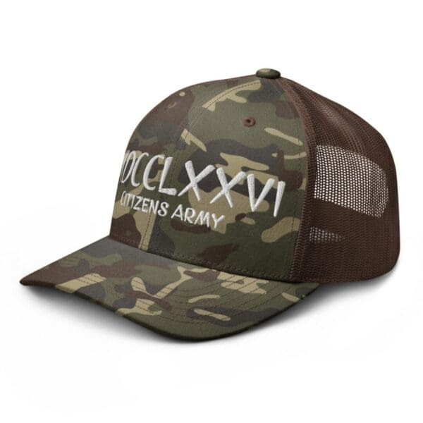 A Camouflage 1247 Snap Back Trucker Hat w/MDCCLXXVI (White Font) with the word xlviii on it.