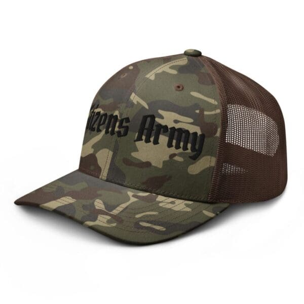 A Camouflage 1247 Snap Back Trucker Hat w/Citizens Army (Black Font) with the word's army on it.