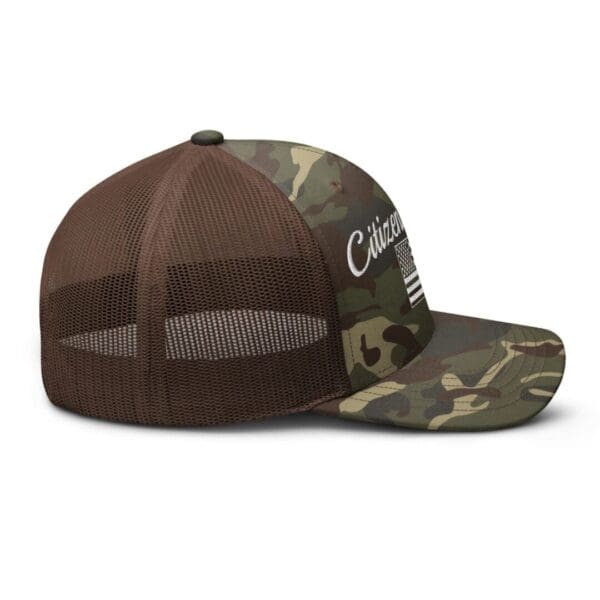 A Camouflage 1247 Snap Back Trucker Hat with Citizens Army & Flag (White Font)