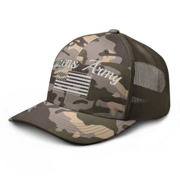 A Camouflage 1247 Snap Back Trucker Hat w/Citizens Army & Flag (White Font) with an american flag on it.