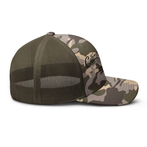 A Camouflage 1247 Snap Back Trucker Hat w/Citizens Army & Flag (Black Font) with the word camo on it.