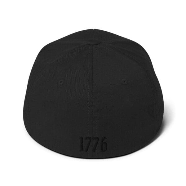 A 6277 Flexfit Cap w/Citizens Army (Black Font) with the word 1776 on it.