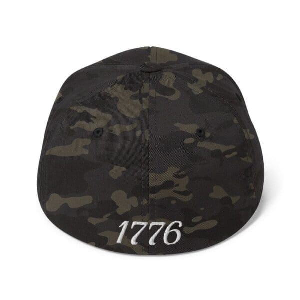 A 6277 Flexfit Cap Citizens Army w/ Flag (White Font) hat with the word 1776 on it.