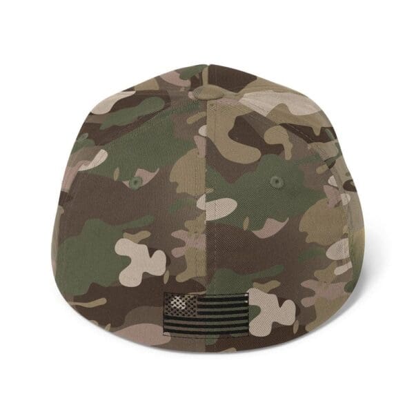 A 6277 Flexfit Cap w/ Black Logo hat with an american flag on it.