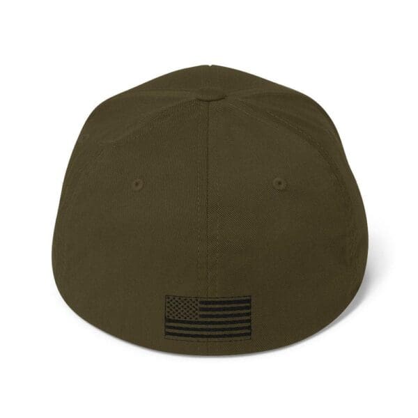 The back view of an olive green 6277 Flexfit Cap w/ Black Logo with an american flag on it.