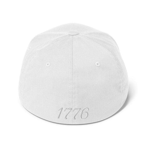 A 6277 Flexfit Cap Citizens Army w/ Flag (White Font) with the word 1777 on it.