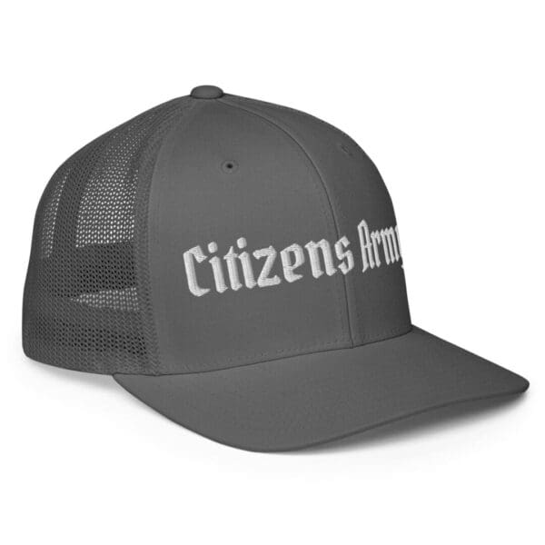 A gray 6511 Flexfit Trucker Cap with the words "Citizens Army" in white font on it.