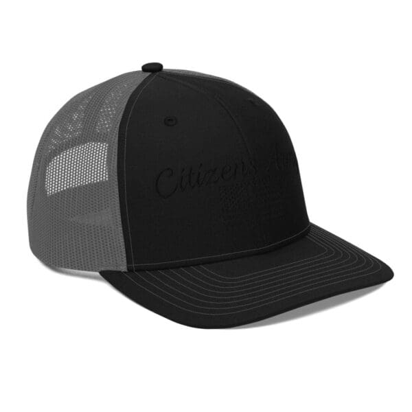 A 112 Snap Back Trucker Cap Citizens Army w/ Flag (Black Font) with the word citizen on it.