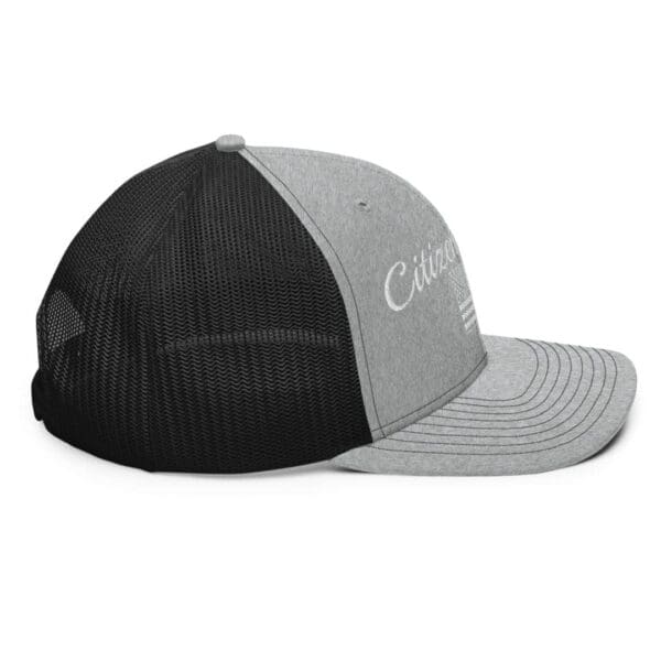 A grey and black 112 Snap Back Trucker Cap Citizens Army w/ Flag (White Font) with the word california on it.
