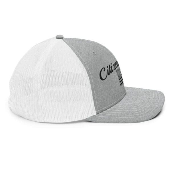 A grey and white 112 Snap Back Trucker Cap Citizens Army w/ Flag (Black Font) with the word citizen on it.