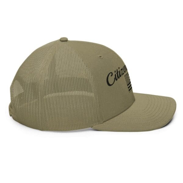 A 112 Snap Back Trucker Cap Citizens Army w/ Flag (Black Font) with the word citizen on it.